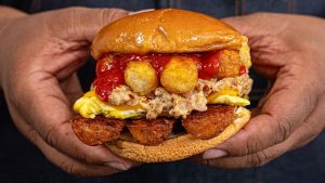 Breakfast Sandwich with Sausage Gravy, Eggs, Tots