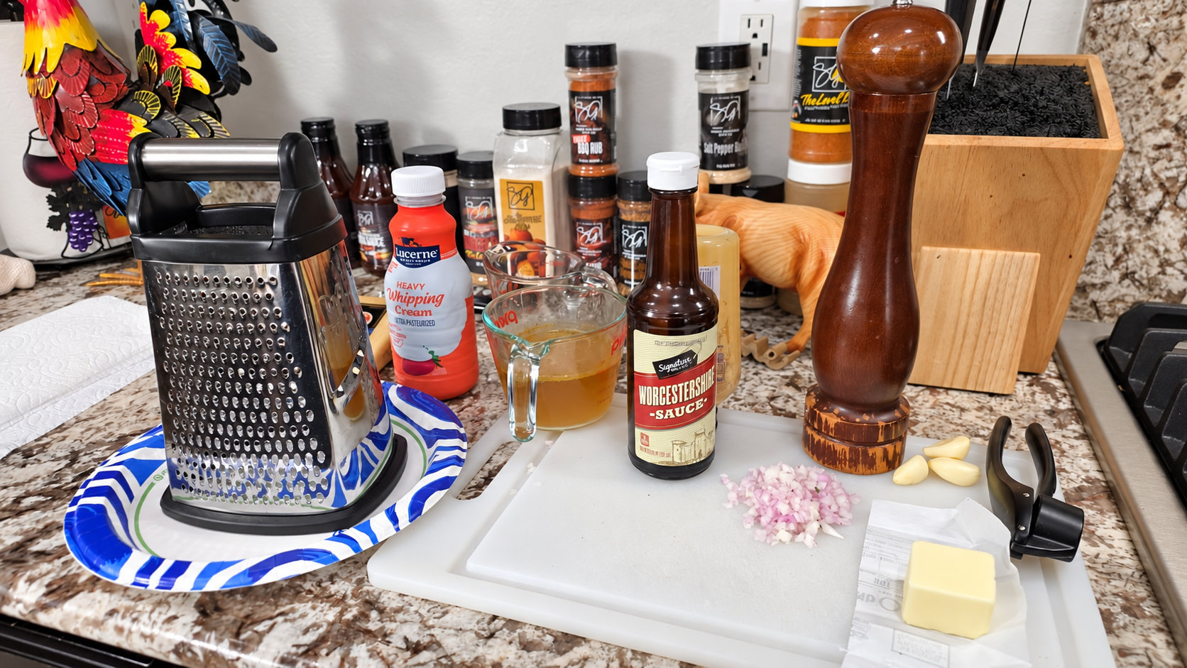 Chicken au poivre sauce ingredients and tools arranged on the kitchen counter.