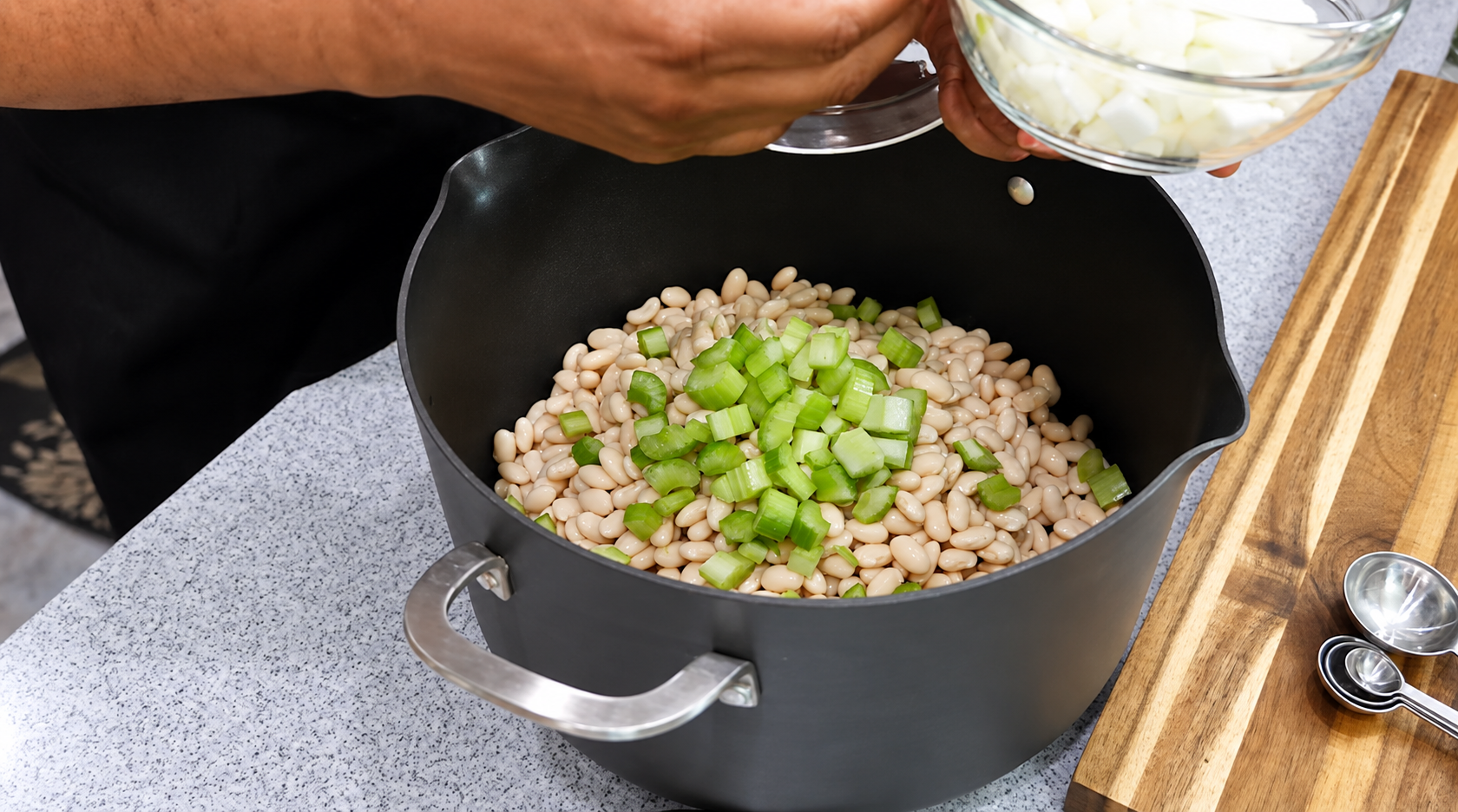Chopped celery added to the soaked white beans before the onion.