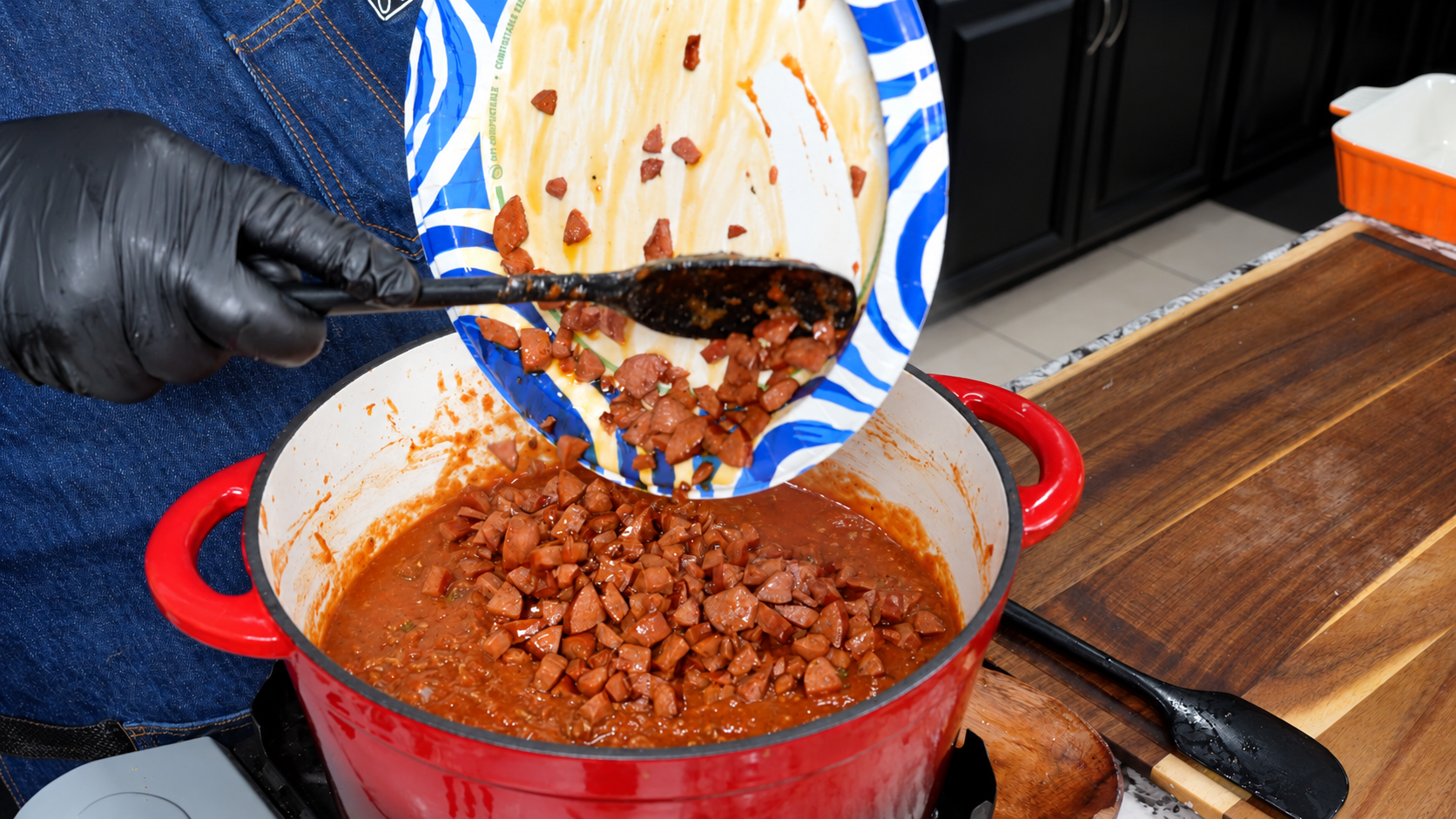 Browned smoked sausage added back to the thick lasagna meat sauce.